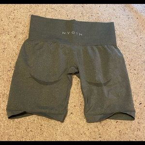NVGTN olive green contour shorts